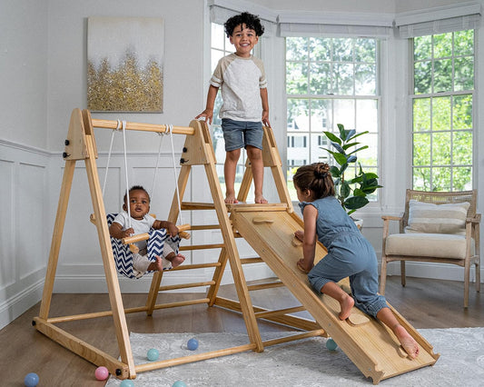 Gimnasio de juegos interior 4 en 1 Juniper de Avenlur: juego de gimnasio de jungla con columpio, tobogán, escalera y pared de escalada para bebés, juego de madera plegable, gimnasio de jungla interior para niños de 18 meses a 6 años